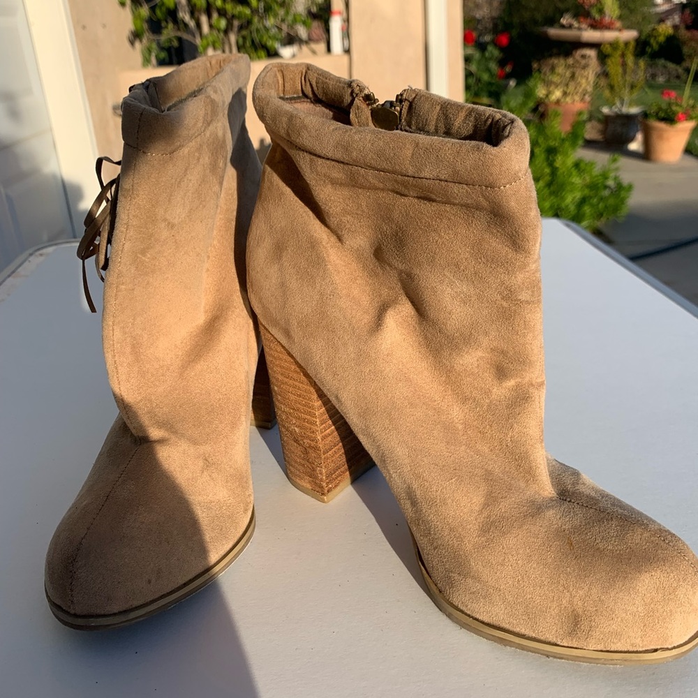 Used. Tan booties. Size 8. Fringe zipper detail.
